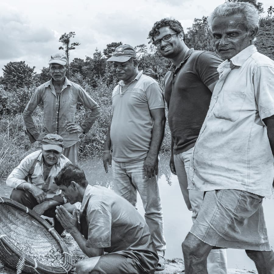 A lapidary cutting and grading a Ceylon sapphire by hand in Beruwala